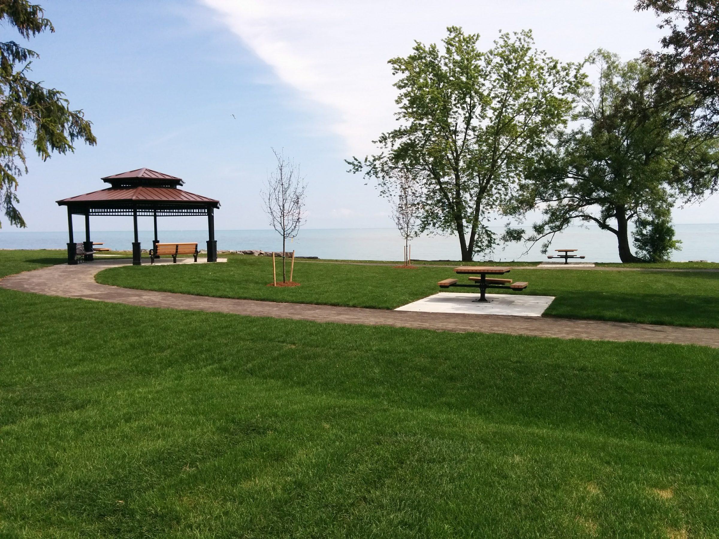 Park gazebo and benches by lake