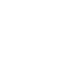 Stack of rocks on shallow water during sunset.