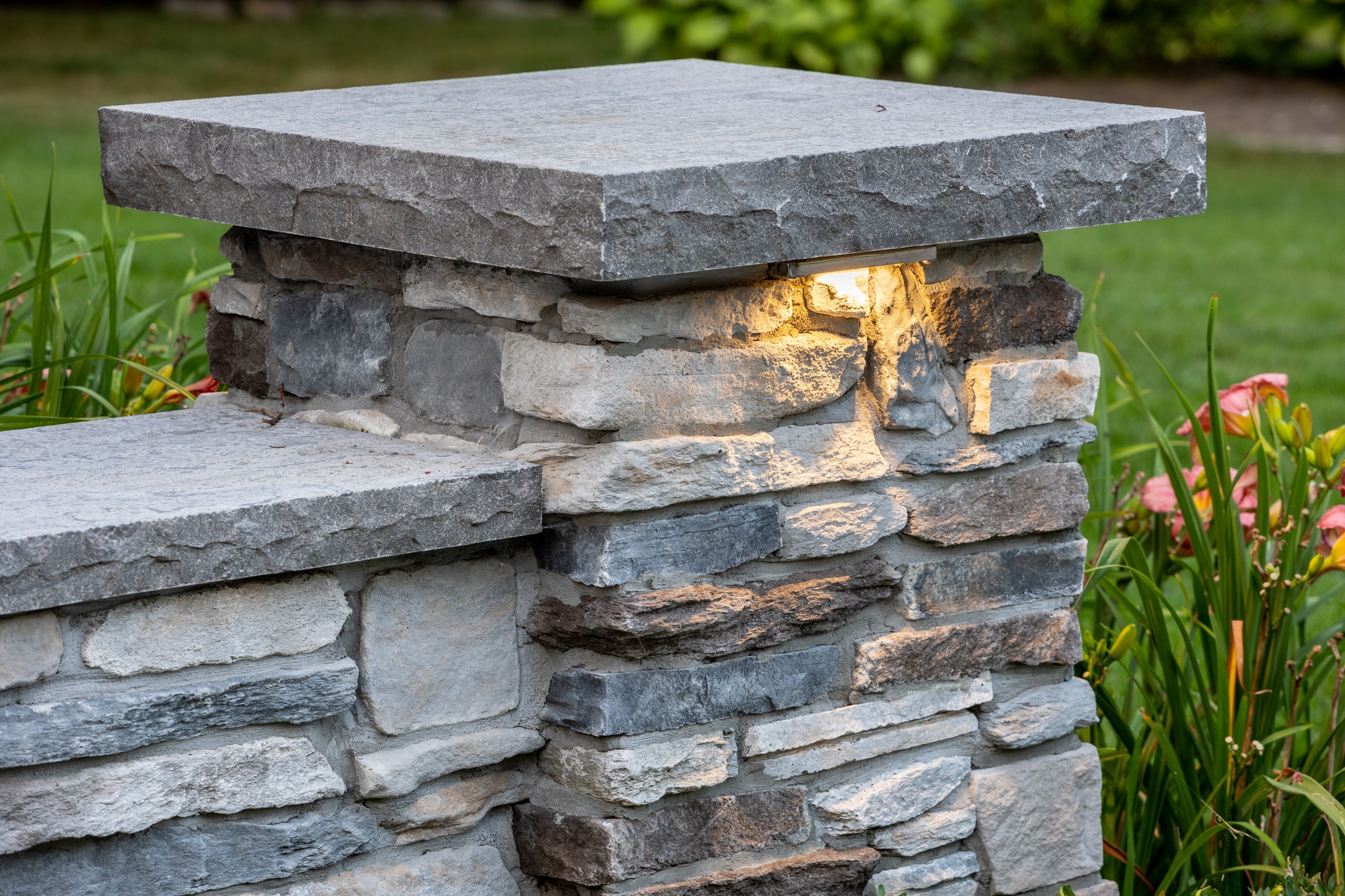 Stone pillar with built-in garden light