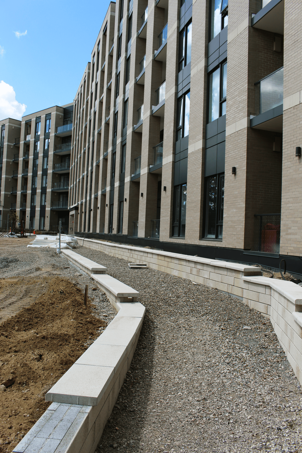 Modern apartment building under construction, view from side