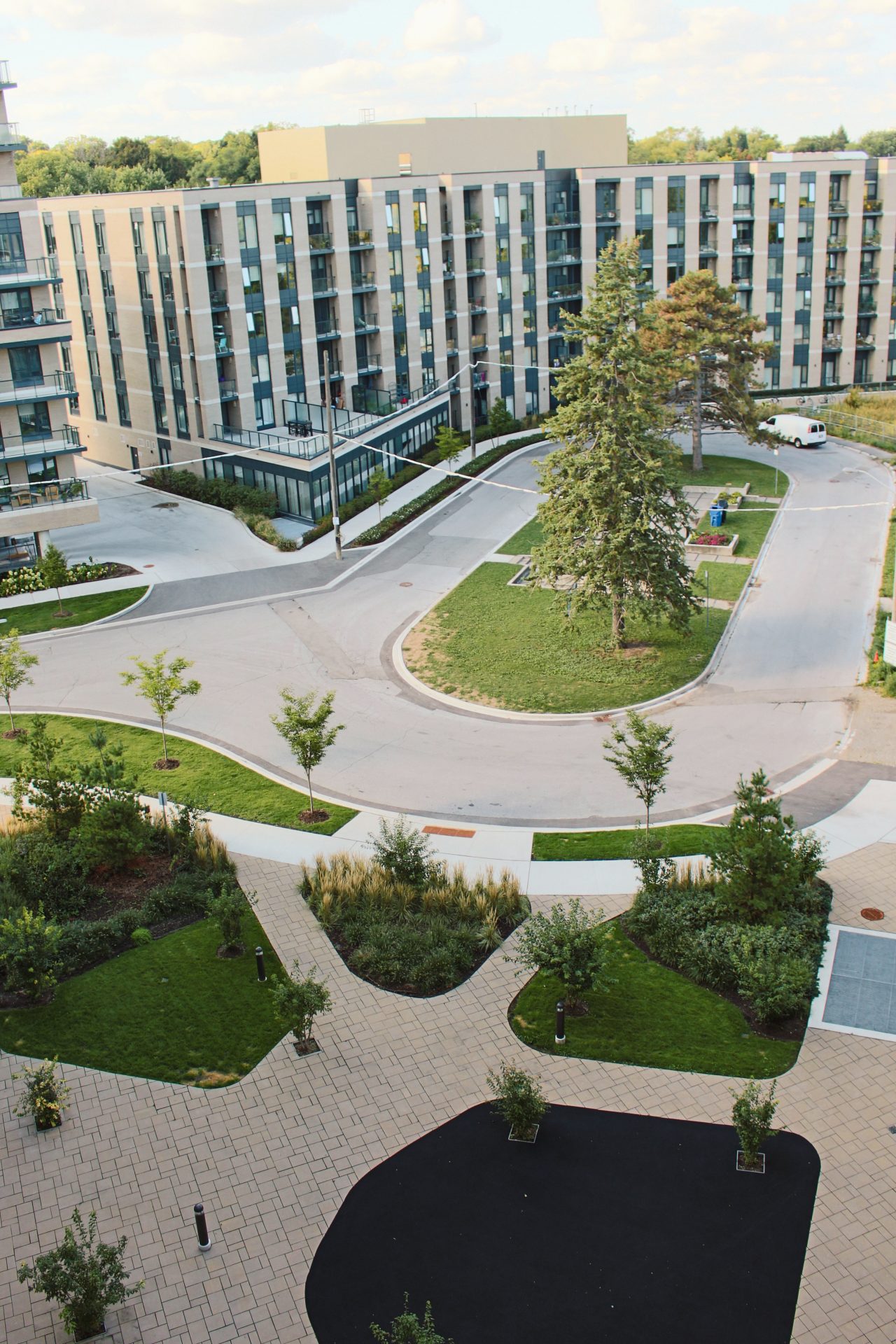 Modern apartment complex with landscaped courtyard