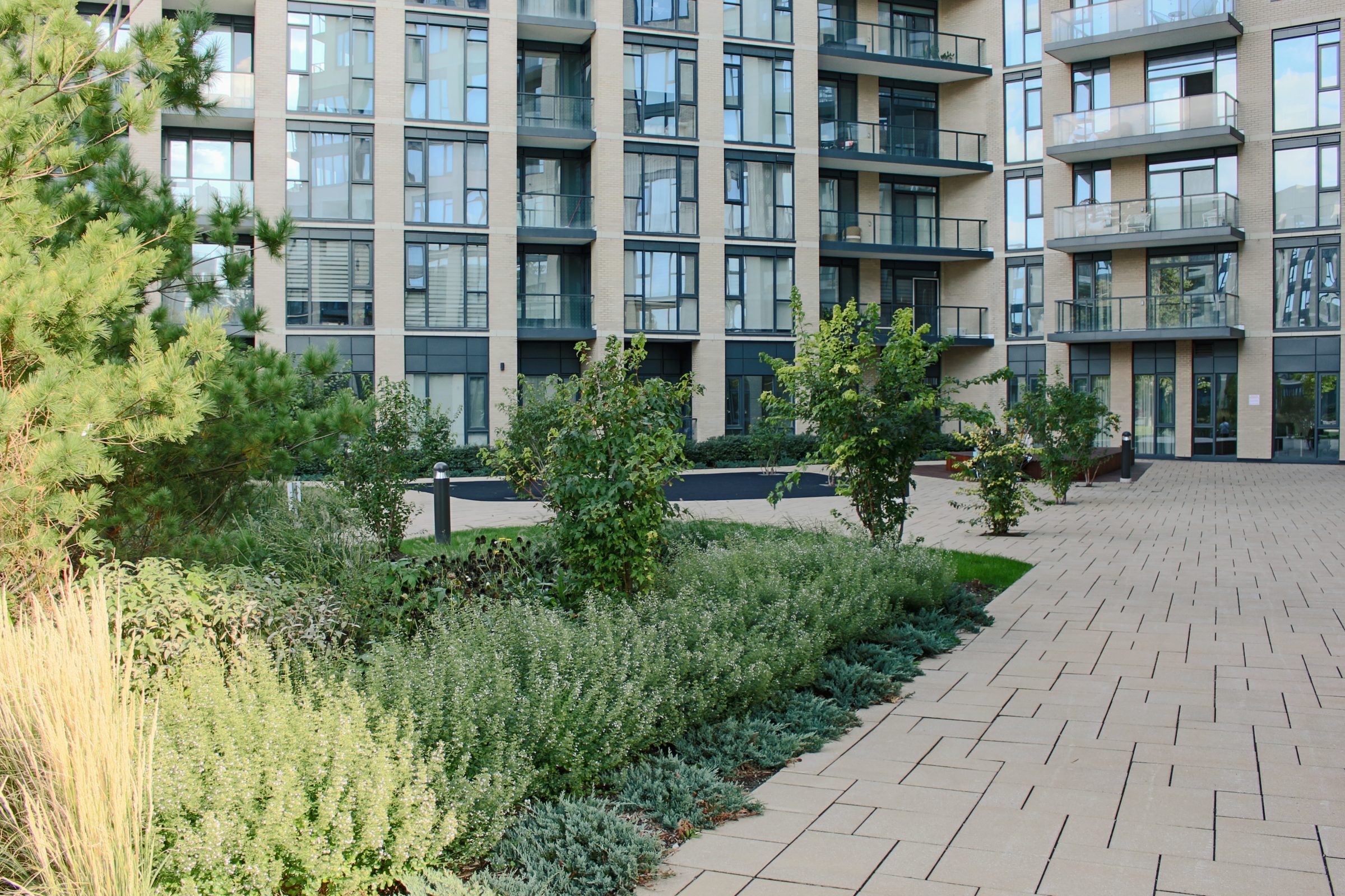 Modern apartment building with landscaped courtyard