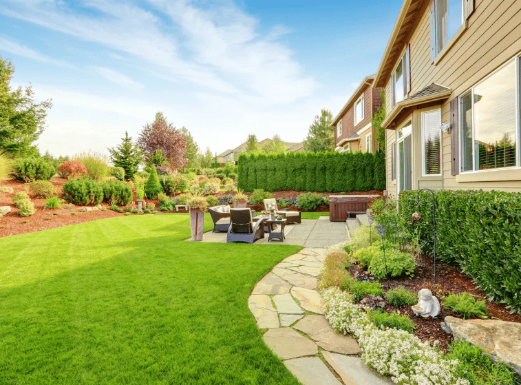 Spacious backyard with patio and lush garden